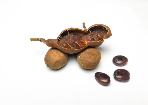Tamarind, an Asian spice, isolated on a white background.