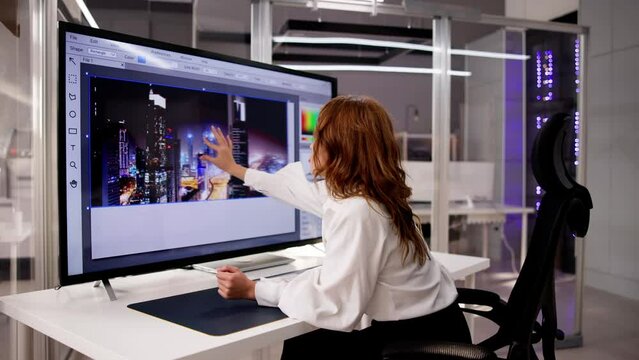 Designer Editing Photo On Computer