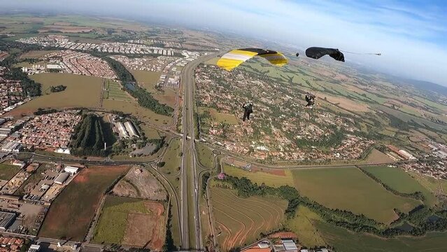 Adventurous Skydiving in Boituva: Parachutist's Exciting Glide, Moments Filled with Joy and Thrills