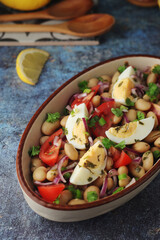 A bowl with Piyaz salad - traditional dish of Turkey