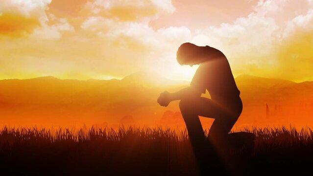 Silhouette of a man praying outside at beautiful landscape, motion graphics
