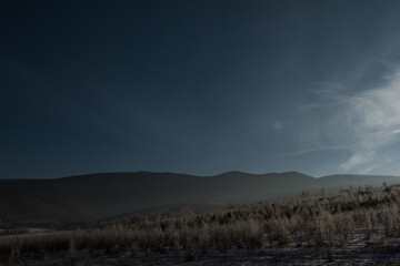 Winter landscape on the Sayan Mountains located in Siberia near Lake Baikal