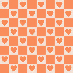 Color coral squares in a checkerboard with hearts pattern. Abstract background.Checkerboard, chessboard, seamless pattern.