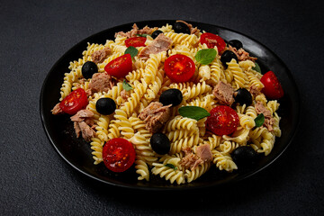 Tuna salad, fusilli pasta, olives and cherry, olive oil, homemade,