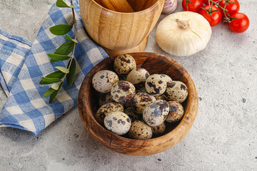Raw quail eggs in the bowl