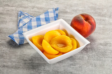 Ripe sweet and juicy canned peach