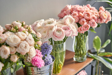 Many different flowers on Showcase. Background of mix of flowers. Beautiful flowers for catalog or online store. Floral shop and delivery concept.