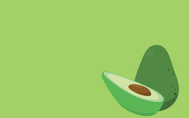avocado cut with its seed on green background