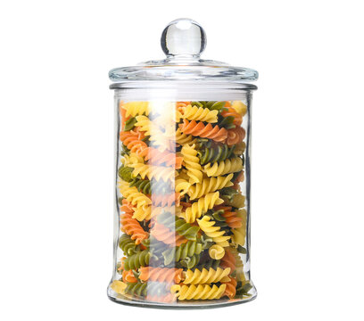 Glass jar with mixed rotini pasta, red, yellow and green pasta