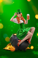 Irish girl holding big mugs with beer or ale sitting on cauldron with gold coins. Young red-haired...