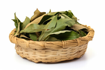 Obraz premium Basket filled with leaves on top of white table.