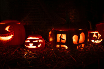Halloween pumpkins background. Carved Jack O' Lanterns