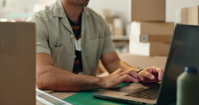 Businessman, laptop and typing with box in logistics, supply chain or inventory management at warehouse. Closeup of man hands working on computer in small business for shipping, ecommerce or orders