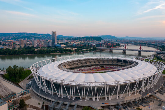 Aerial skyline view of the brand new National Athletics Centre of Budapest, which will host the World Athletics Championships Budapest 23. Danube river and buda hills at the background.