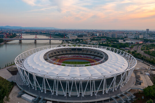 Aerial skyline view of the brand new National Athletics Centre of Budapest, which will host the World Athletics Championships Budapest 23. Danube river at the background.