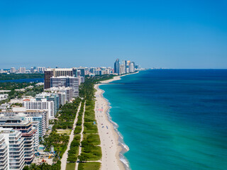 Aerial photo Miami Surfside Florida beachfront condominiums