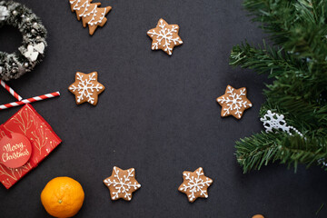Christmas and new year, gingerbread cookies in the shape of snowflakes on a christmas background