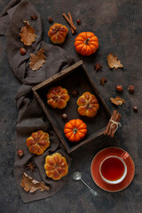 Homemade sweet pumpkin cinnabons, buns with cinnamon