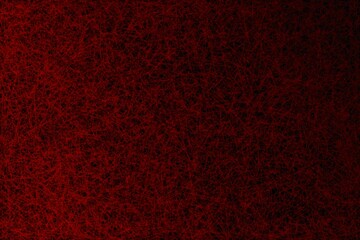 Fototapeta premium Wallpaper, texture in the form of coloured lines reminiscent of crayons. Colour transition. Disordered lines, different directions of lines. Different shades of red on a black background. 
