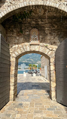 stone ancient arch, door for entry and exit the ancient city of Budva, Montenegro