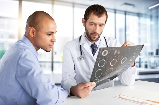 Happy doctor with a man patient for healthcare treatment, AI generated image