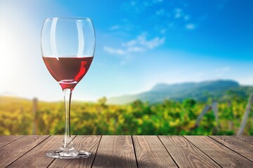 Glass of tasty alcohol wine on the hills