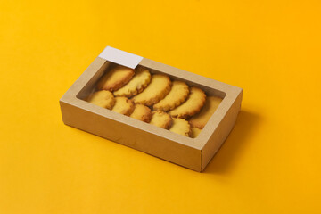 Classic round shortbread cookies in a box. Close-up