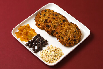 Oatmeal cookies with chocolate filling and raisins. Close-up	