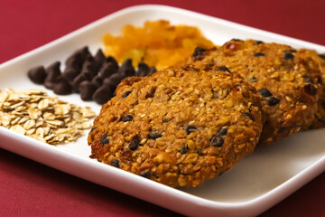 Oatmeal cookies with chocolate filling and raisins. Close-up	