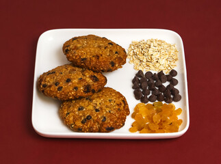 Oatmeal cookies with chocolate filling and raisins. Close-up