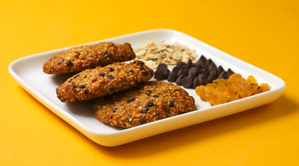 Oatmeal cookies with chocolate filling and raisins. Close-up