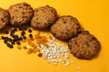 Oatmeal cookies with chocolate filling and raisins. Close-up
