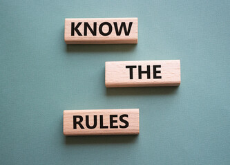 Know the rules symbol. Wooden blocks with words Know the rules. Beautiful grey green background. Business and Know the rules concept. Copy space.
