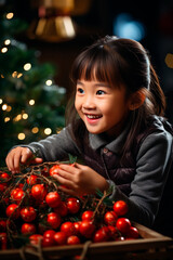 happy korean girl decorates christmas tree