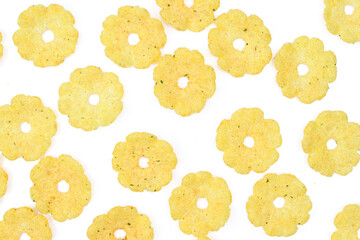 Full background of flower shaped salty and crispy peanut snack isolated