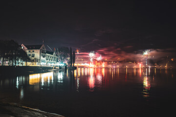 New Year's Eve midnight fireworks over the promenade of Peterhausen, taken from the boardwalk next...