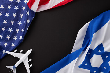 U.S.-Israel aviation linkage troubles. Top view photo of American flag and Israeli flag, airplane...