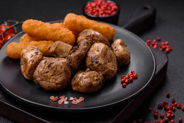 Delicious juicy whole champignons baked on the grill with salt and spices