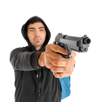 Male student with gun on white background. School shooting concept