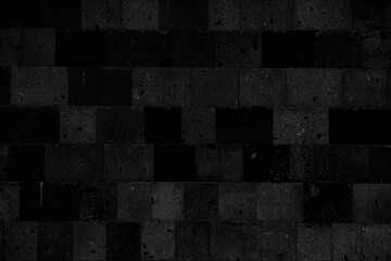 AI generated illustration of a black brick wall backdrop