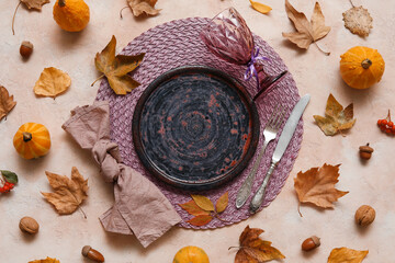 Beautiful table setting for Thanksgiving Day celebration on grunge beige background