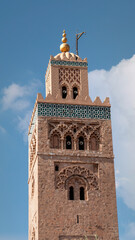 Fototapeta premium Koutoubia Mosque minaret located at Marrakesh medina quarter. It is the largest and most iconic mosque in Marrakesh, Morocco.