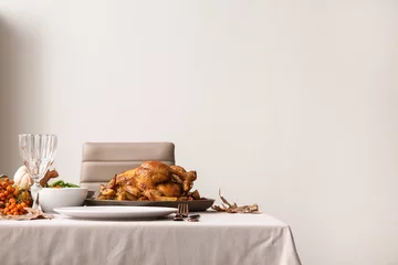Deurstickers Festive table setting with tasty food for Thanksgiving Day in room © Pixel-Shot