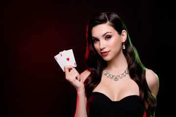 Photo of gorgeous lady working in poker club proffesional player winning isolated over black color background