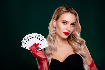 Photo of lady millionaire famous star hold playing card winning fortune in casino club green...