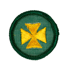 Close up of an isolated vintage scouting badge