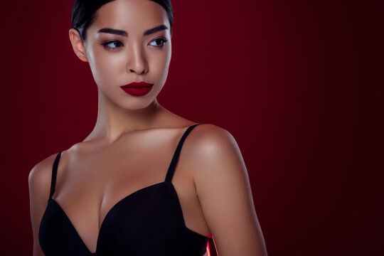Photo of stunning asian woman femme fatale look empty space black bra shoulders off isolated dark red color background