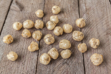 Fritillaria assyriaca bulbs on garden table.
