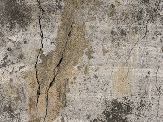 Old wall with cracked plaster. Weathered rough surface. Vintage texture is perfect for background and design.