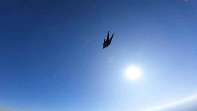 Extreme Parachutist Woman Enjoying Freefall Dive from Airplane, Inspiring Adventure in High Altitude Skydiving